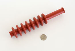 red tube shapped silicone piece