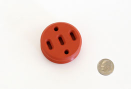small red plastic piece